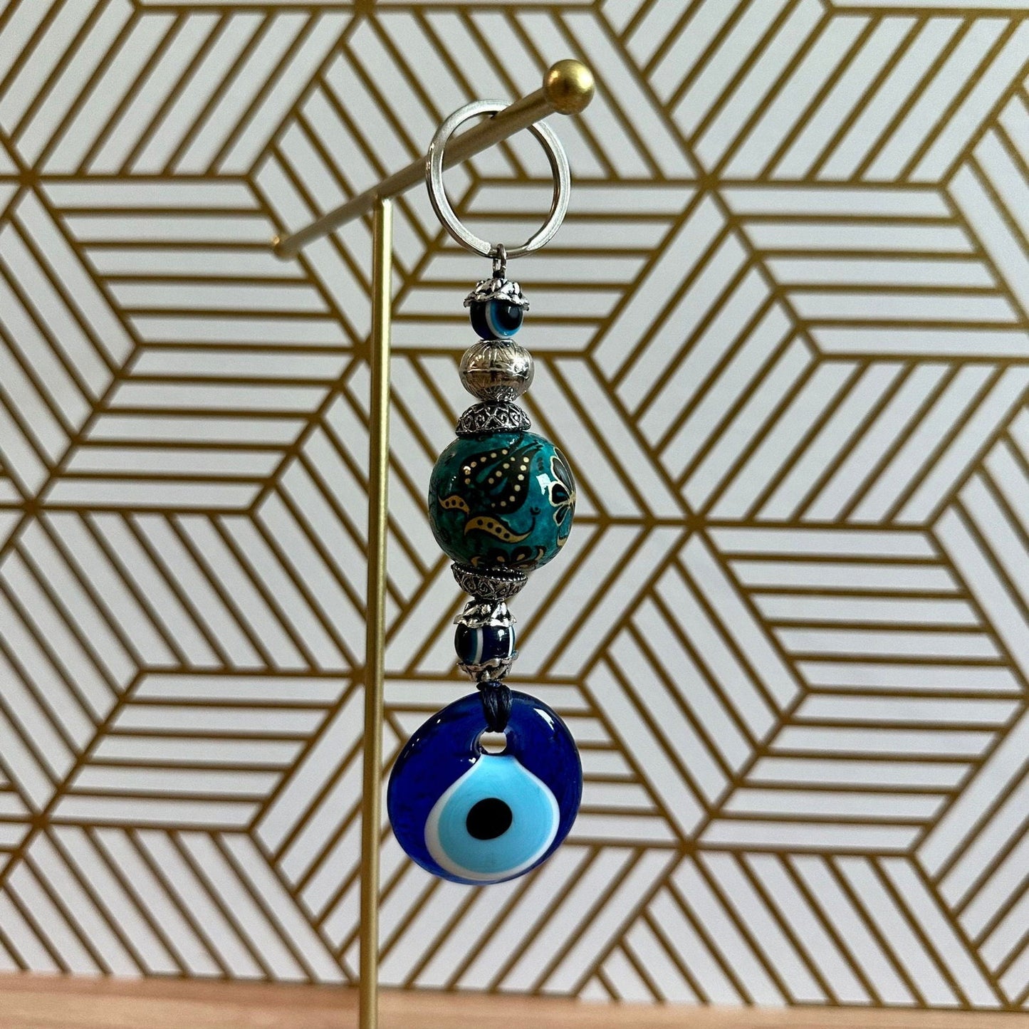 Evil eye keychain with metal ring, stacked beads, blue ceramic evil-eye charm