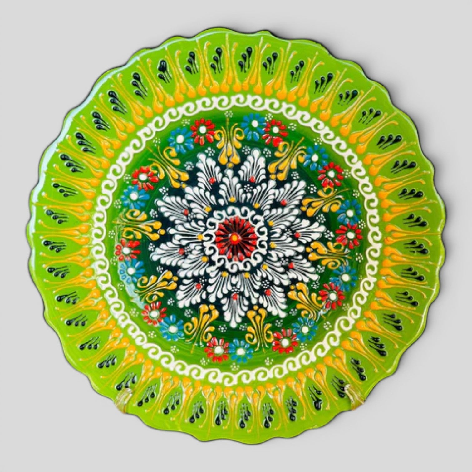 Hand-painted Turkish ceramic decorative plate, bright green floral tulip mandala design