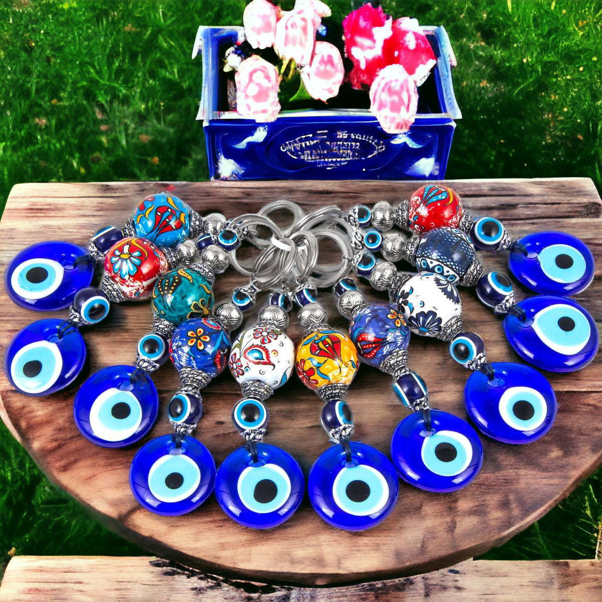 Assorted evil eye keychain set with blue glass beads and painted ceramic charms