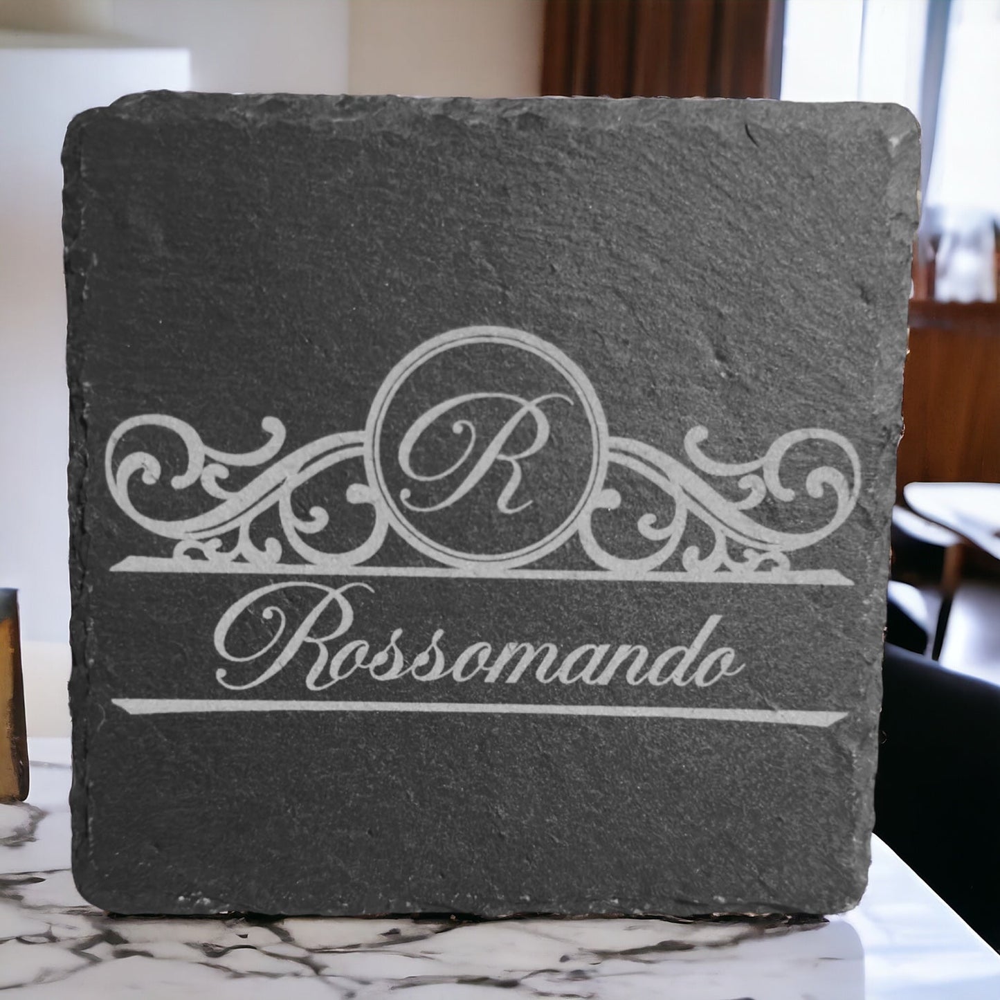 Slate coaster with engraved Rossomando logo