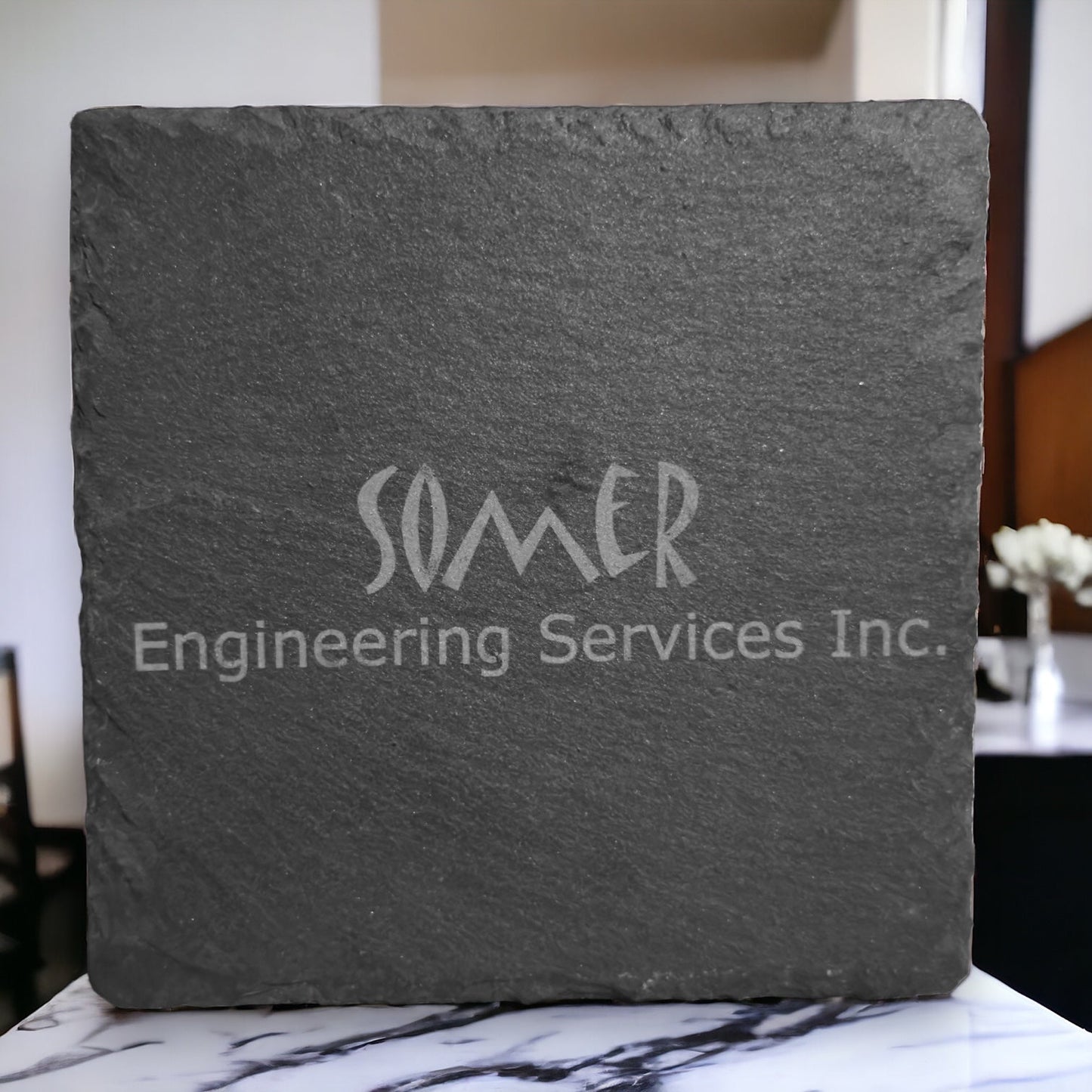 Slate coaster with engraved SOMER Engineering Services Inc. text
