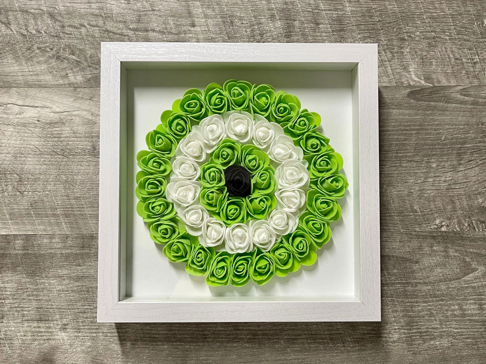 Handmade evil eye rose shadowbox with lime green and white coil rosette in white frame