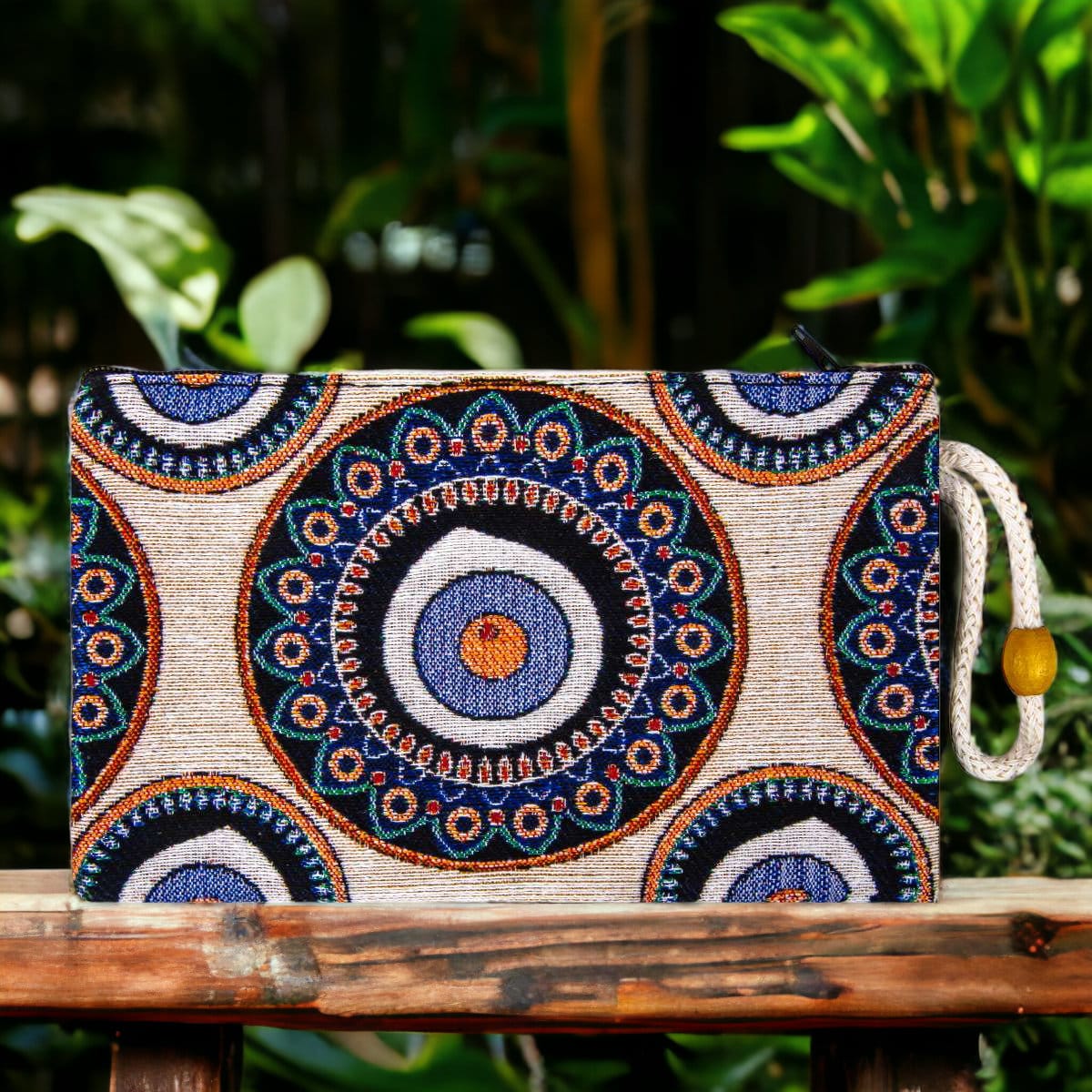 Blue zipper clutch pouch with evil eye mandala and geometric patterns