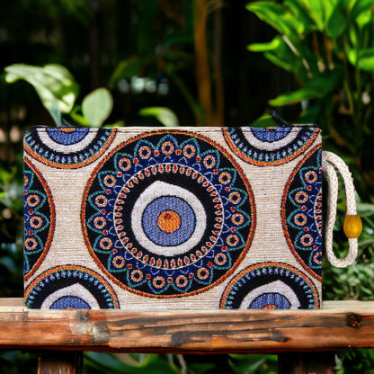 Blue zipper clutch pouch with evil eye mandala and geometric patterns