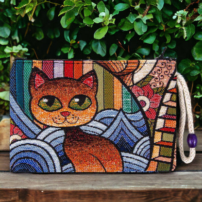 Colorful woven cat art zipper clutch pouch with geometric patterns and purple zipper pull