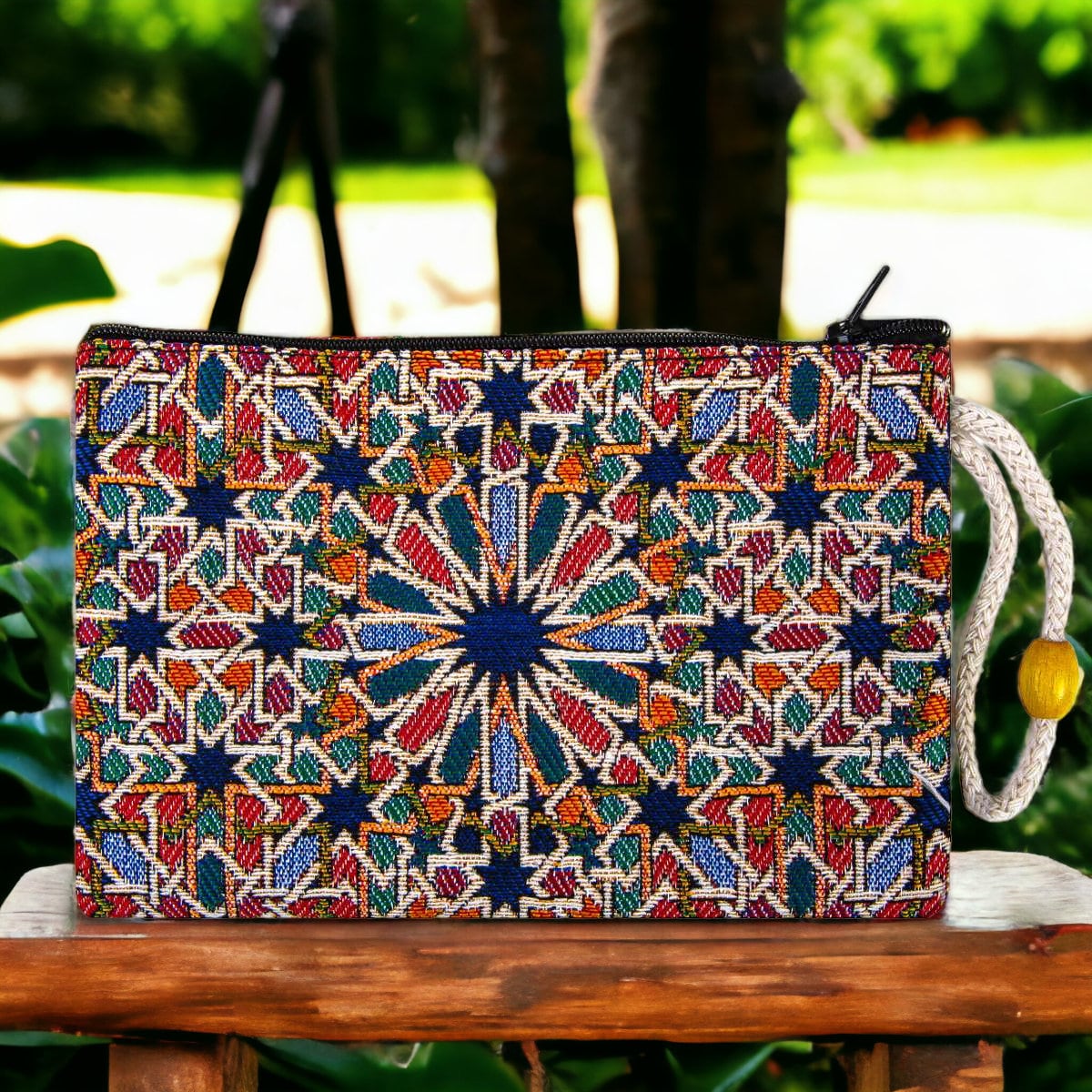Kilim-style zipper clutch pouch with multicolor star mandala and braided cord