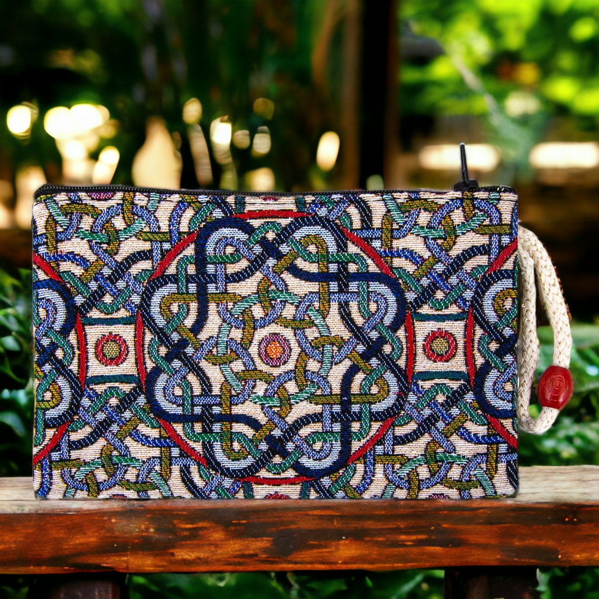 Multicolor geometric kilim fabric zipper clutch purse with ornate central medallion