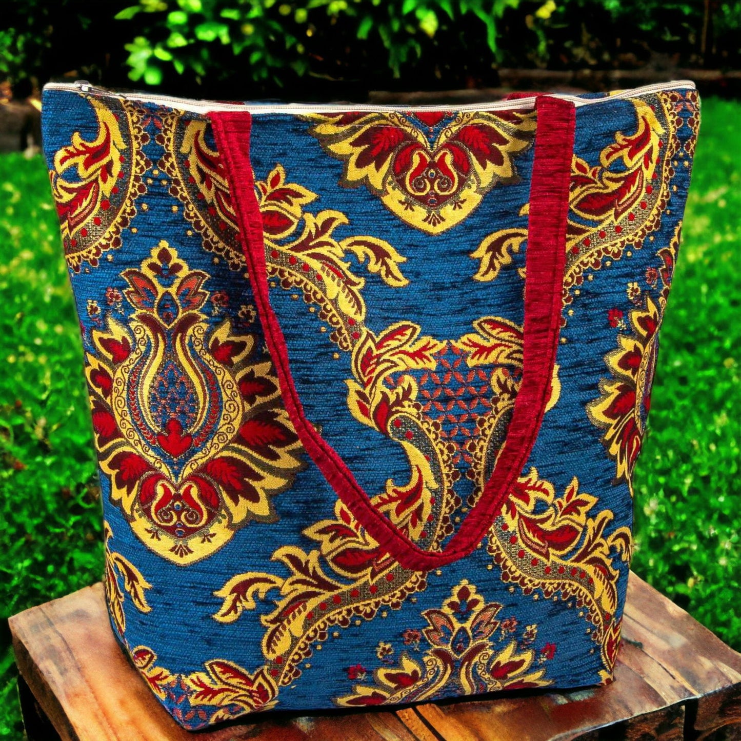 Blue, red and yellow patterned fabric tote bag with short handles