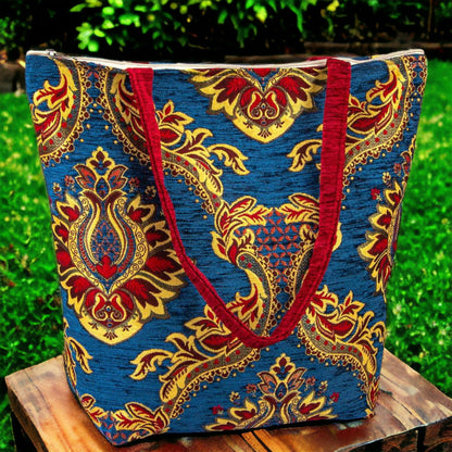 Blue, red and yellow patterned fabric tote bag with short handles