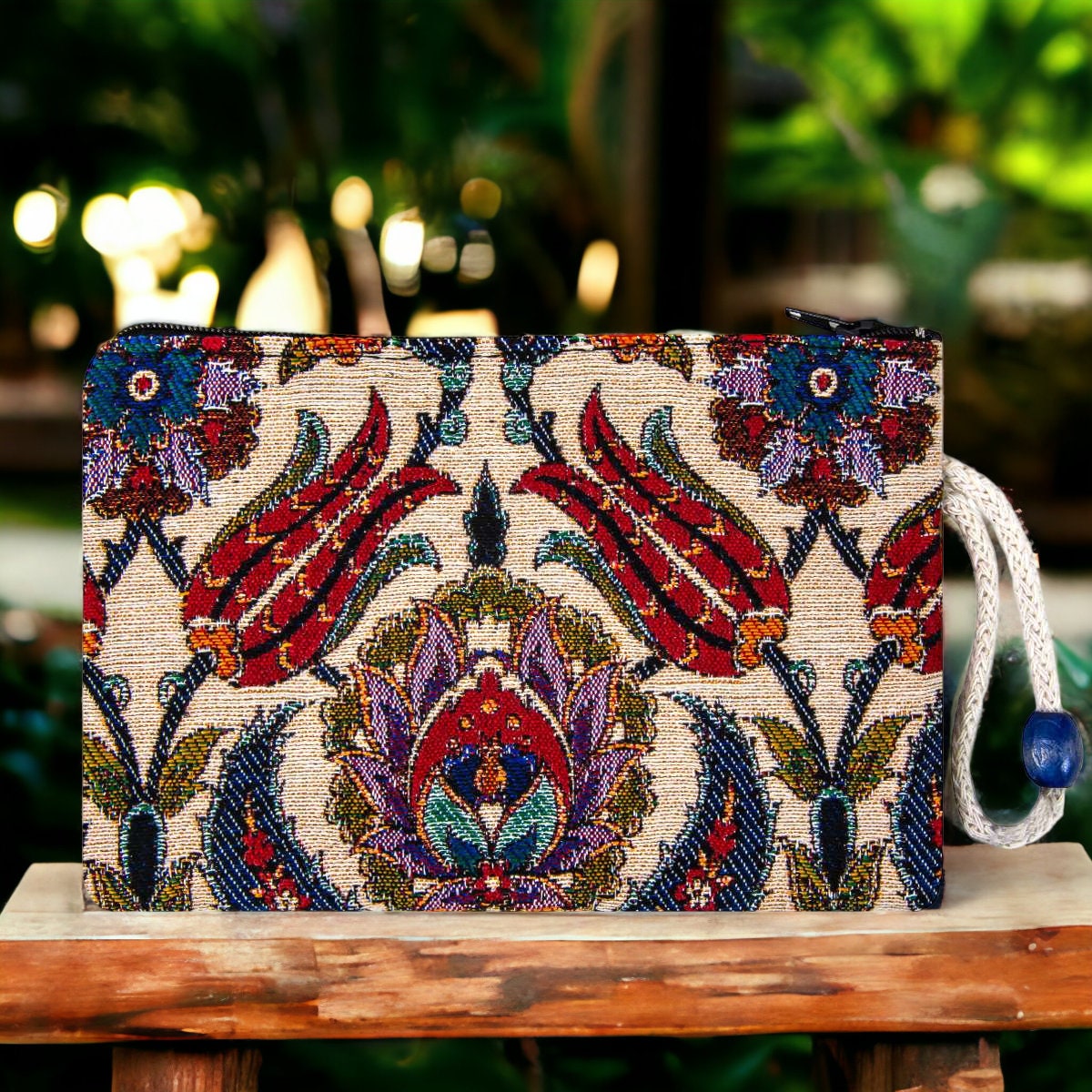 Kilim fabric zipper clutch pouch with red tulip pattern and blue tassel cord