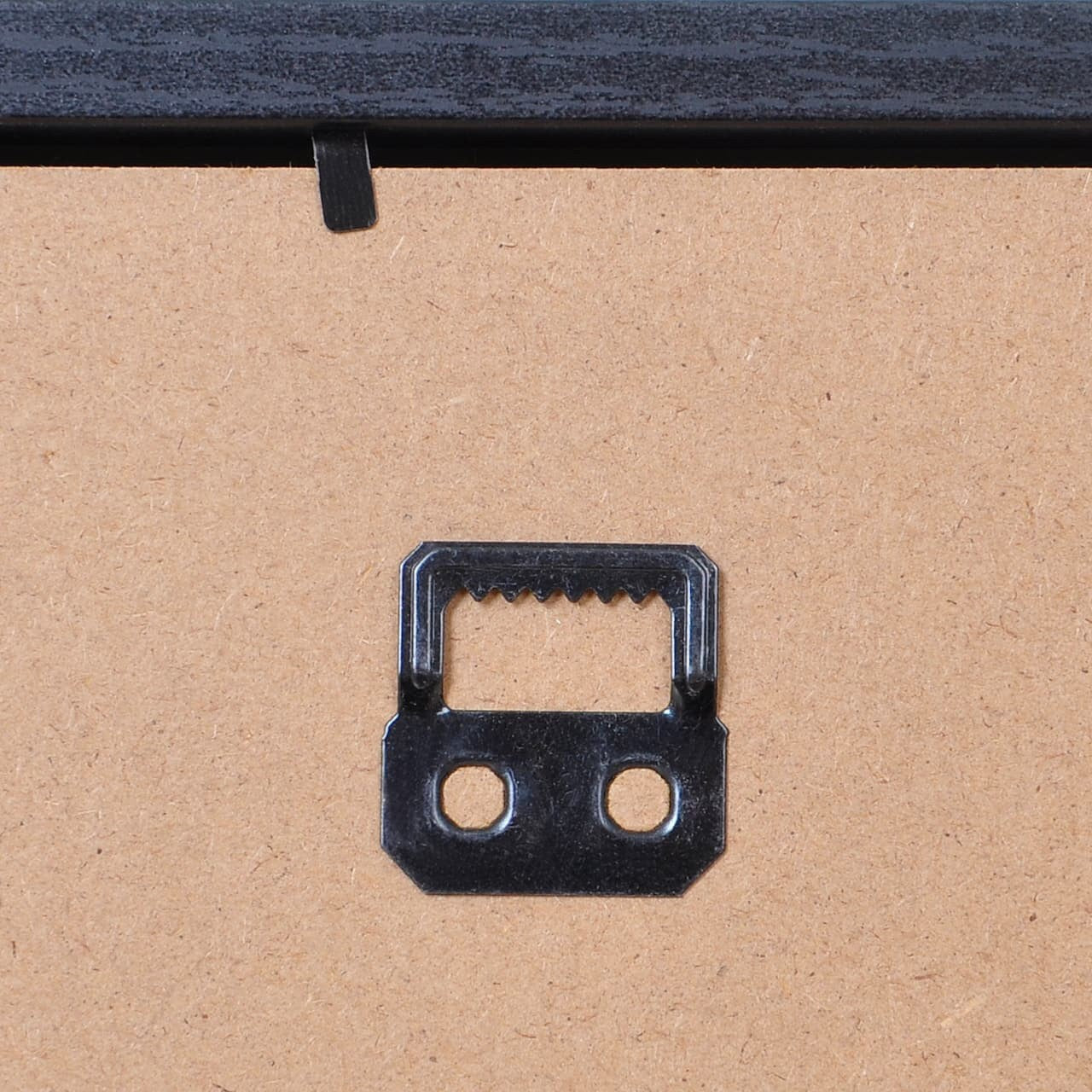 Black shadow box hanging hardware with loop latch on cardboard backing