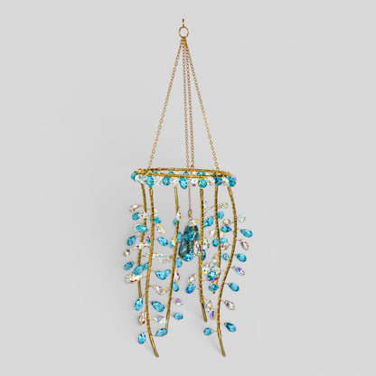 Gold hanging suncatcher with blue/clear prismatic beads and jellyfish charm