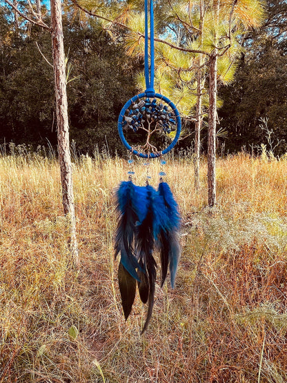 Blue dreamcatcher wall hanging with beaded Tree of Life and blue feathers