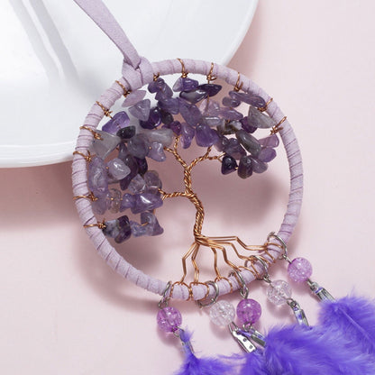 Round dreamcatcher hoop with gold tree wire and purple amethyst stones, with hanging charms