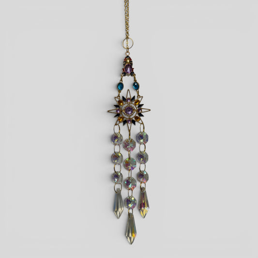 Hanging crystal sunburst suncatcher with multicolor faceted beads and teardrop drops