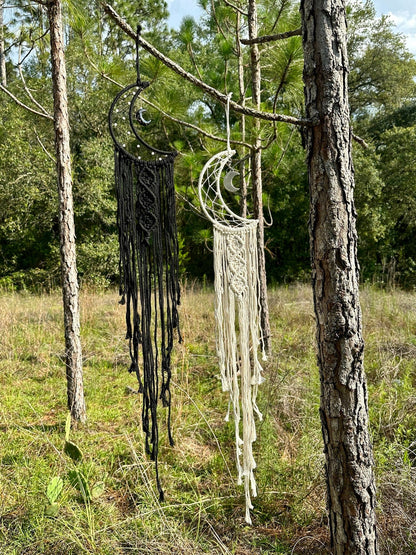 Macrame dream catcher wall hanging with crescent moon charms, black and cream fringe