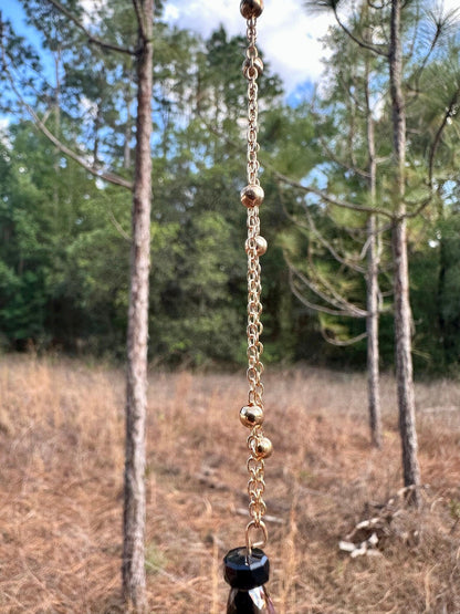 Dreamcatcher hanging charm with gold chain and black heart pendant