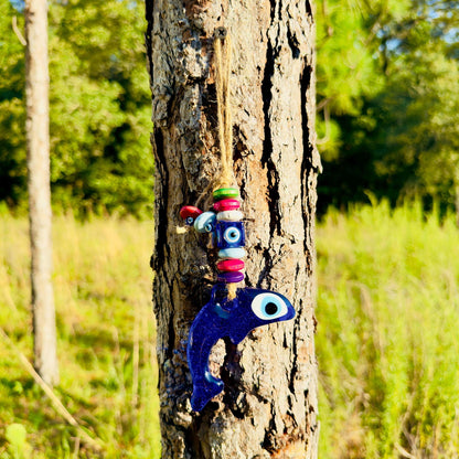 Blue dolphin evil eye wall hanging with colorful wood beads on string