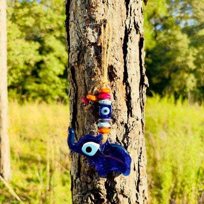 Mini elephant evil eye wall hanging with blue eye and multicolor wood beads on rope