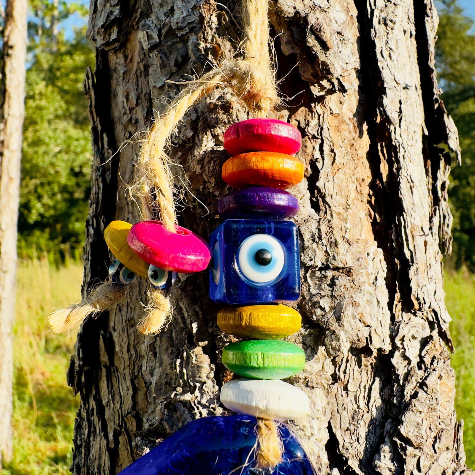 Blue fish evil eye wall hanging with multicolor beads and rope tassel