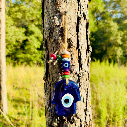 Blue hamsa evil eye charm with stacked wooden beads wall hanging
