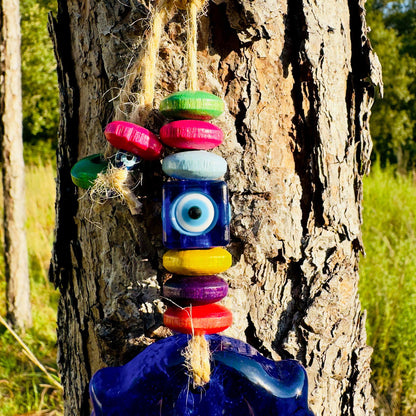 Mini owl wall hanging with stacked multicolor beads and hanging evil-eye ornament