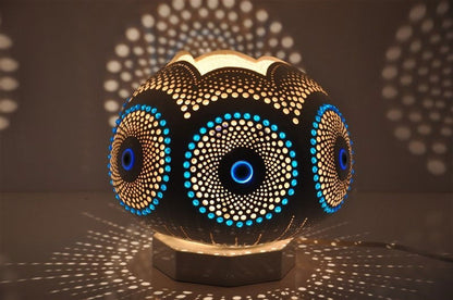 Evil eye mosaic gourd table lamp with blue and gold dot pattern, on square base