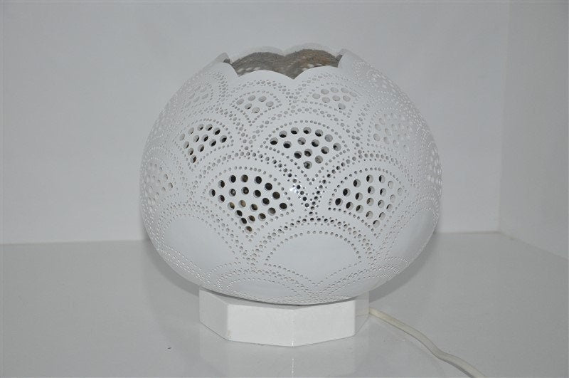 White Moroccan mosaic table lamp with scalloped gourd shade and perforated lantern pattern.