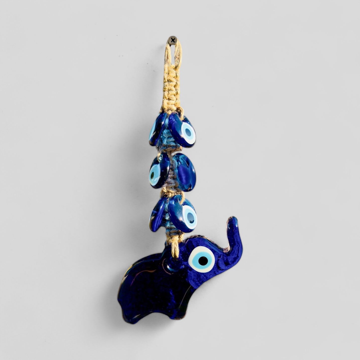 Blue and white evil-eye elephant wall hanging charm with hanging bead accents