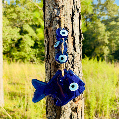 Blue fish wall hanging charm with round evil eye beads and macrame cord loop