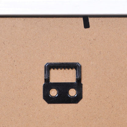 Shadow box backing board with black metal hanger loop in center